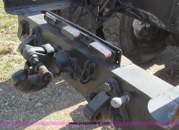 image for item E3819 1989 GMC Sierra tandem axle cab and chassis