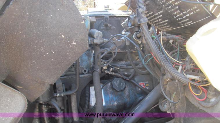 image for item E3819 1989 GMC Sierra tandem axle cab and chassis