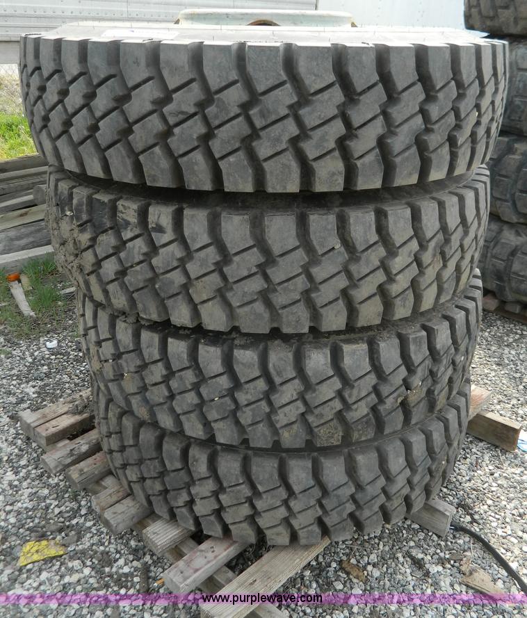image for item Y9406 (4) 11.00R20 tires and wheels