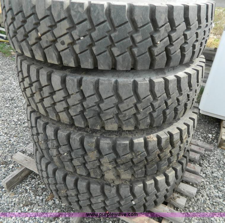 image for item Y9406 (4) 11.00R20 tires and wheels