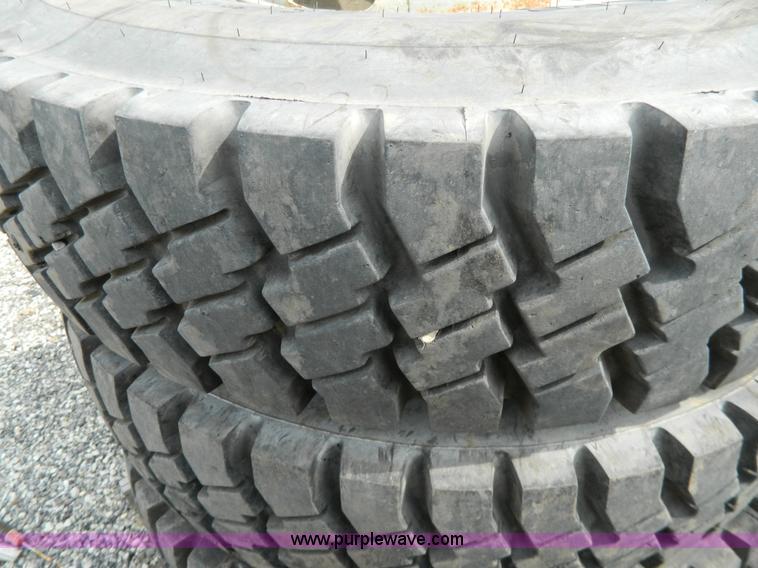 image for item Y9406 (4) 11.00R20 tires and wheels