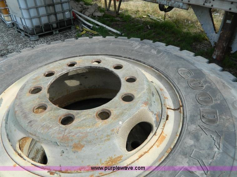 image for item Y9406 (4) 11.00R20 tires and wheels