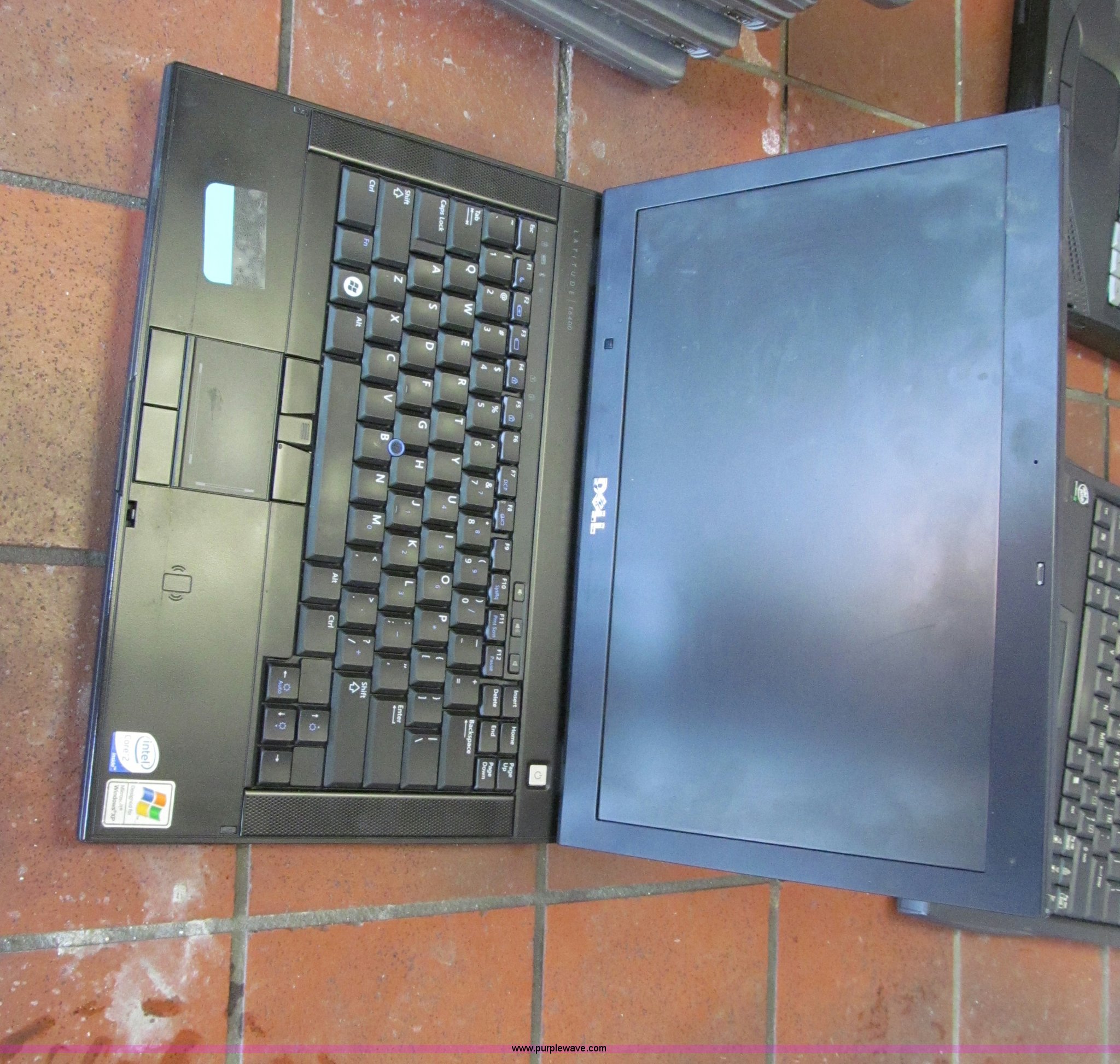 (22) assorted laptops in Kansas City, MO Item E5919 sold Purple Wave