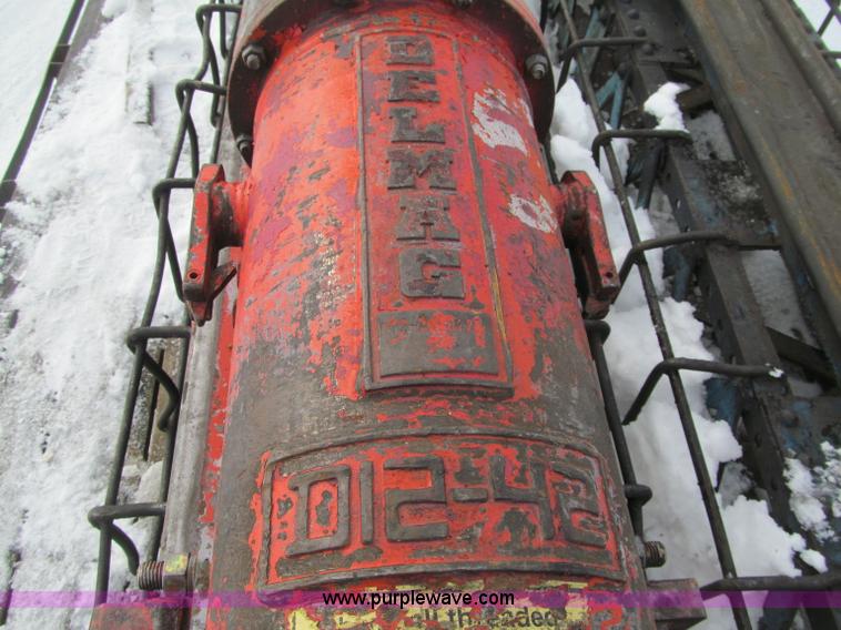 image for item G2573 2001 Delmag D12-42 pile driver and flatbed trailer