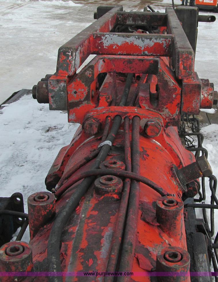 image for item G2573 2001 Delmag D12-42 pile driver and flatbed trailer