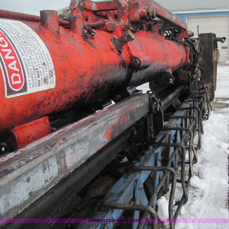 image for item G2573 2001 Delmag D12-42 pile driver and flatbed trailer