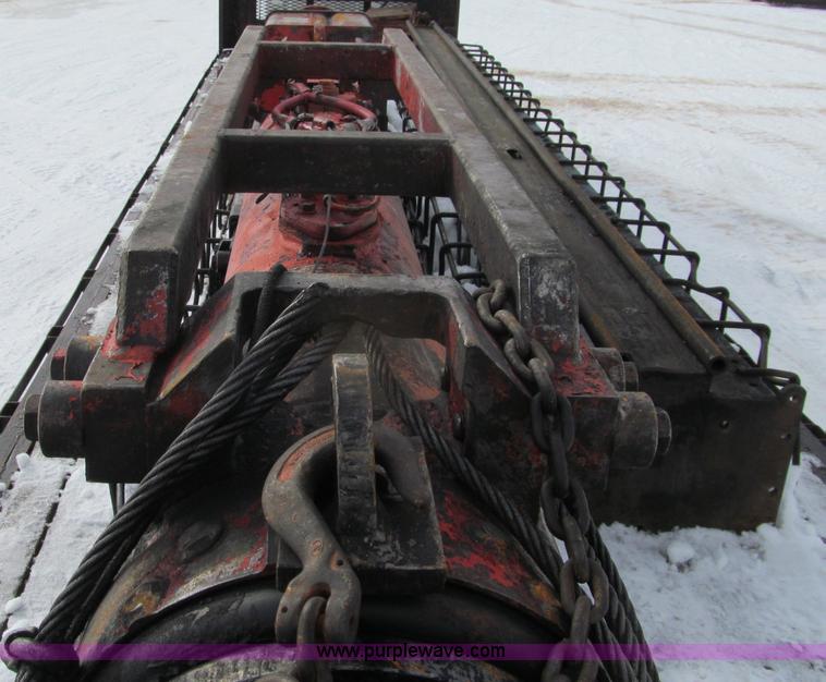 image for item G2573 2001 Delmag D12-42 pile driver and flatbed trailer