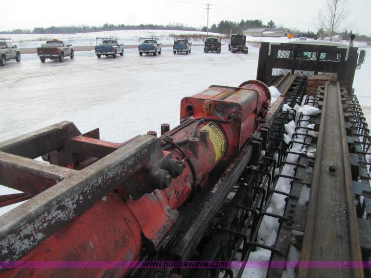 image for item G2573 2001 Delmag D12-42 pile driver and flatbed trailer