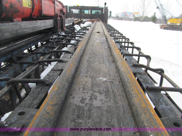 image for item G2573 2001 Delmag D12-42 pile driver and flatbed trailer