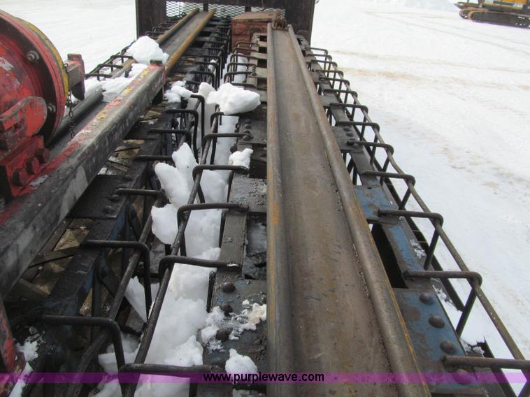 image for item G2573 2001 Delmag D12-42 pile driver and flatbed trailer