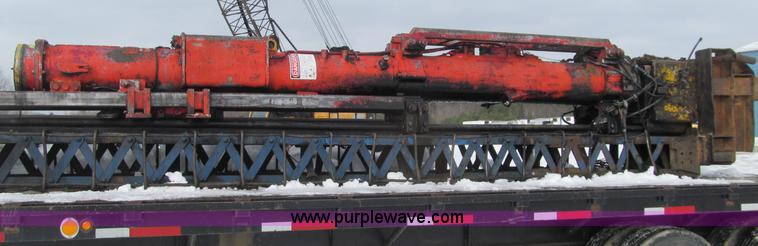 image for item G2573 2001 Delmag D12-42 pile driver and flatbed trailer