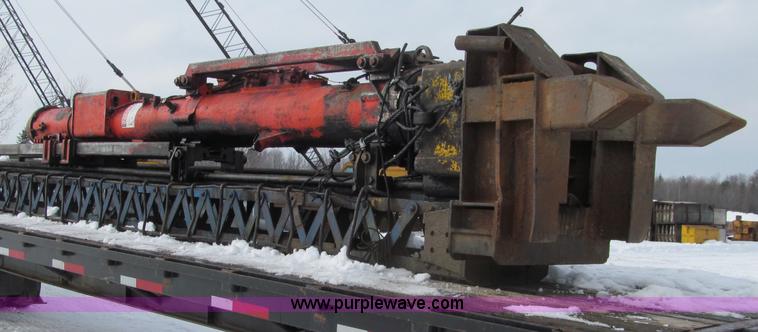 image for item G2573 2001 Delmag D12-42 pile driver and flatbed trailer