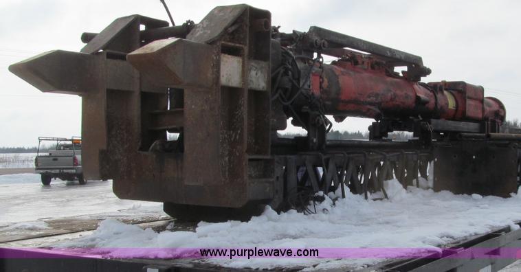 image for item G2573 2001 Delmag D12-42 pile driver and flatbed trailer