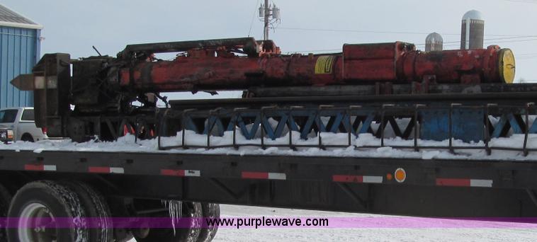 image for item G2573 2001 Delmag D12-42 pile driver and flatbed trailer