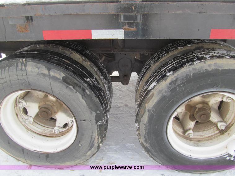 image for item G2573 2001 Delmag D12-42 pile driver and flatbed trailer