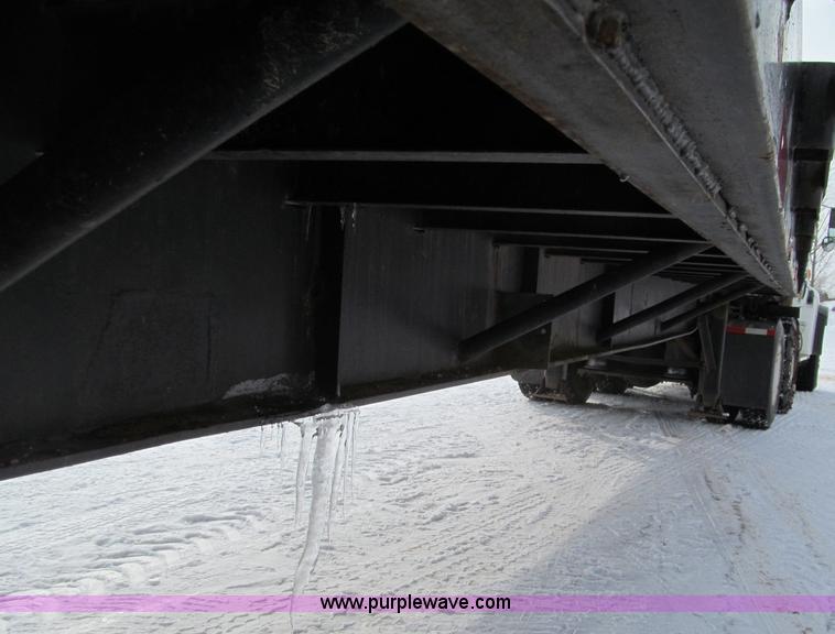 image for item G2573 2001 Delmag D12-42 pile driver and flatbed trailer