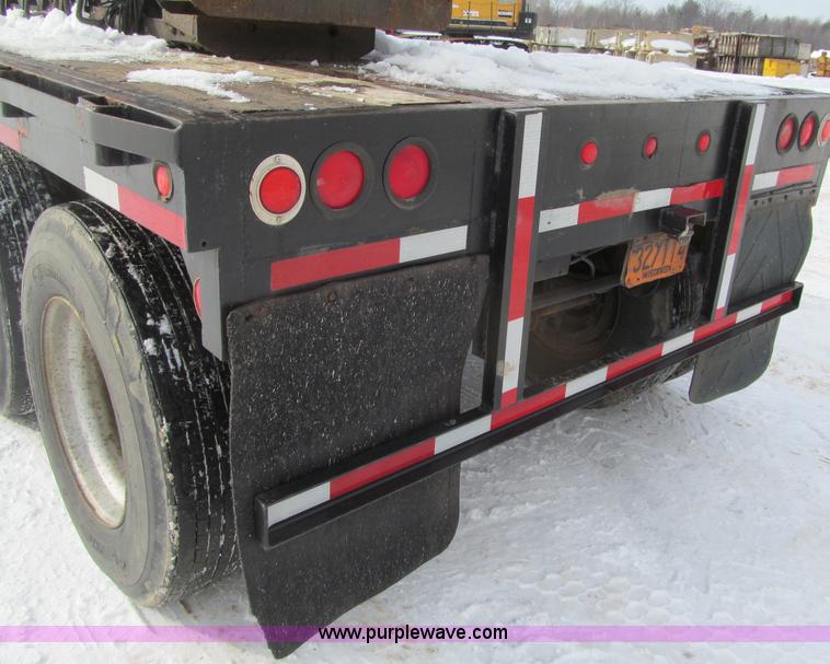 image for item G2573 2001 Delmag D12-42 pile driver and flatbed trailer