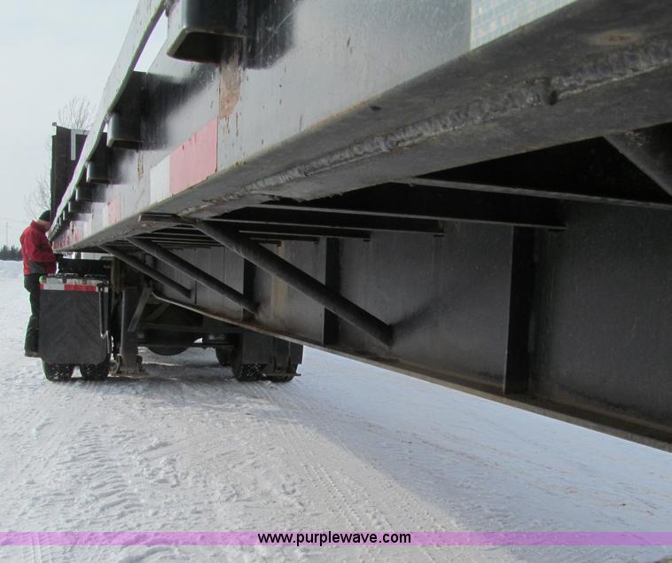 image for item G2573 2001 Delmag D12-42 pile driver and flatbed trailer