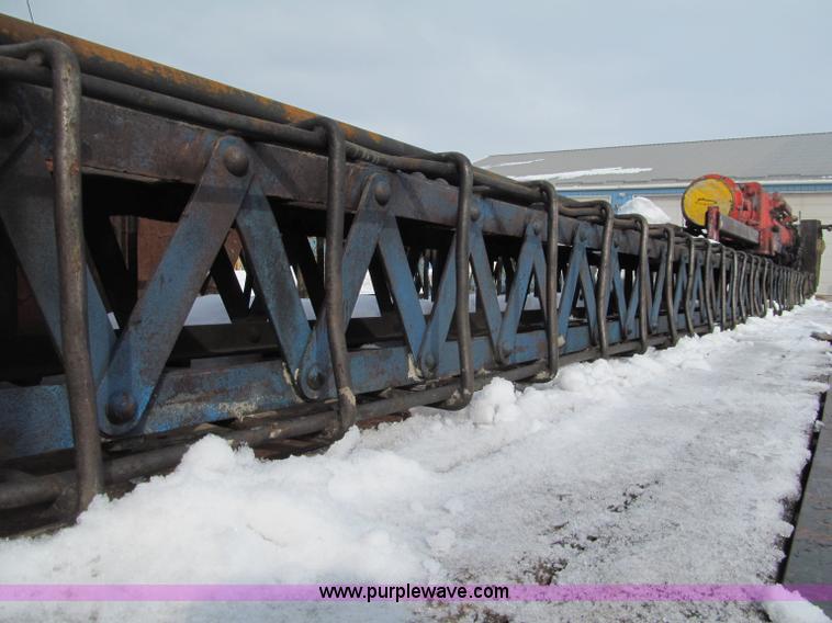image for item G2573 2001 Delmag D12-42 pile driver and flatbed trailer
