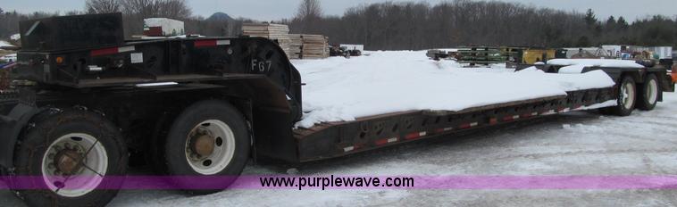 image for item G2577 2001 X-L 80HDG tandem axle lowboy trailer