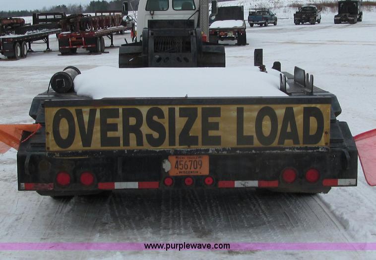 image for item G2577 2001 X-L 80HDG tandem axle lowboy trailer