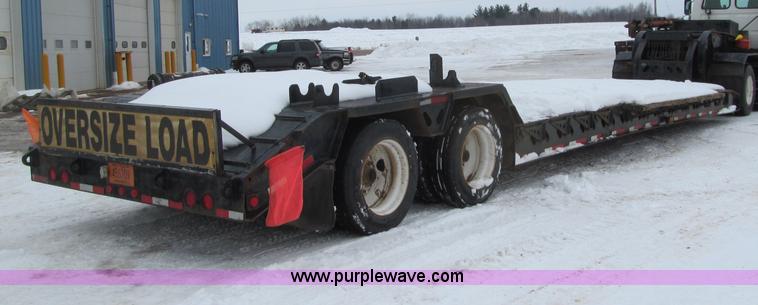 image for item G2577 2001 X-L 80HDG tandem axle lowboy trailer