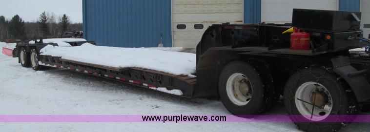 image for item G2577 2001 X-L 80HDG tandem axle lowboy trailer