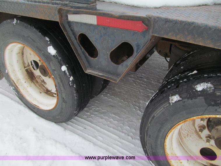 image for item G2577 2001 X-L 80HDG tandem axle lowboy trailer