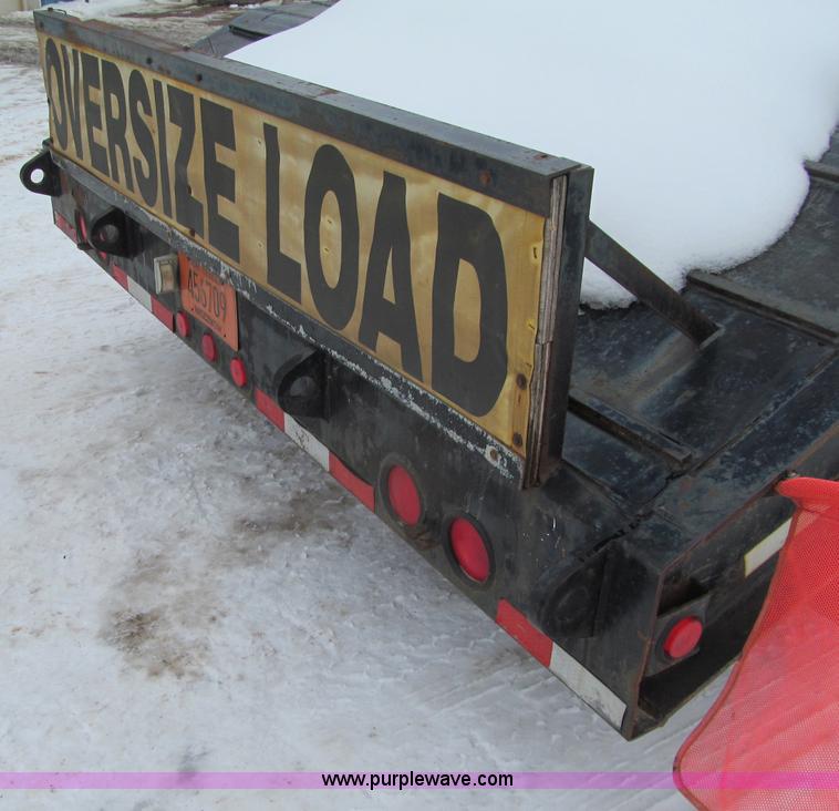 image for item G2577 2001 X-L 80HDG tandem axle lowboy trailer