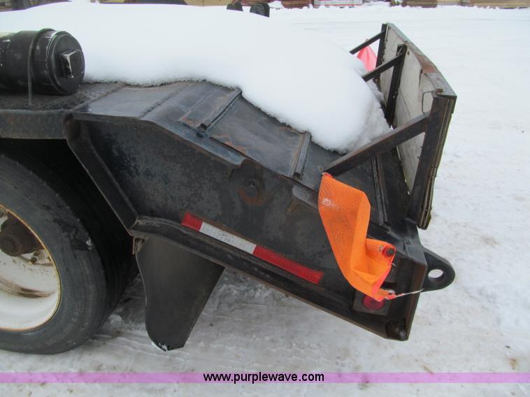 image for item G2577 2001 X-L 80HDG tandem axle lowboy trailer