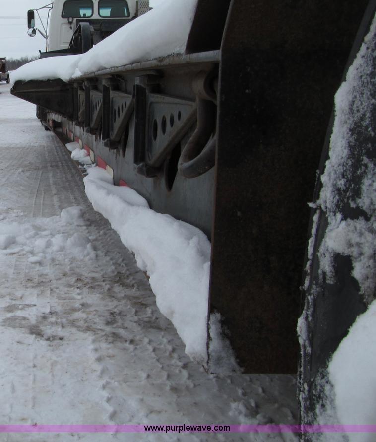 image for item G2577 2001 X-L 80HDG tandem axle lowboy trailer