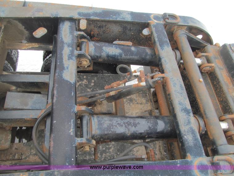 image for item G2577 2001 X-L 80HDG tandem axle lowboy trailer