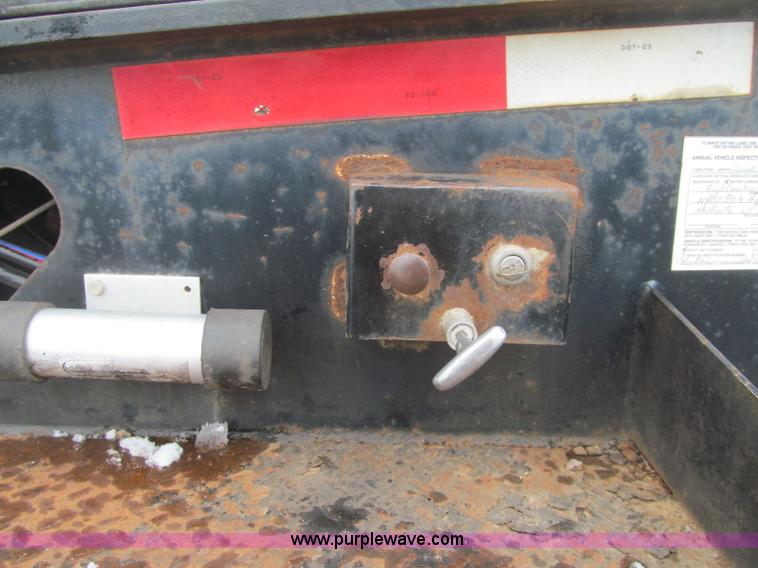 image for item G2577 2001 X-L 80HDG tandem axle lowboy trailer