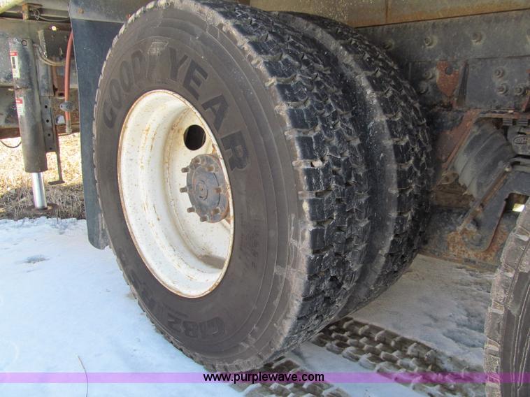 image for item D7250 2003 Freightliner FL80 Crew Cab tandem axle boom truck