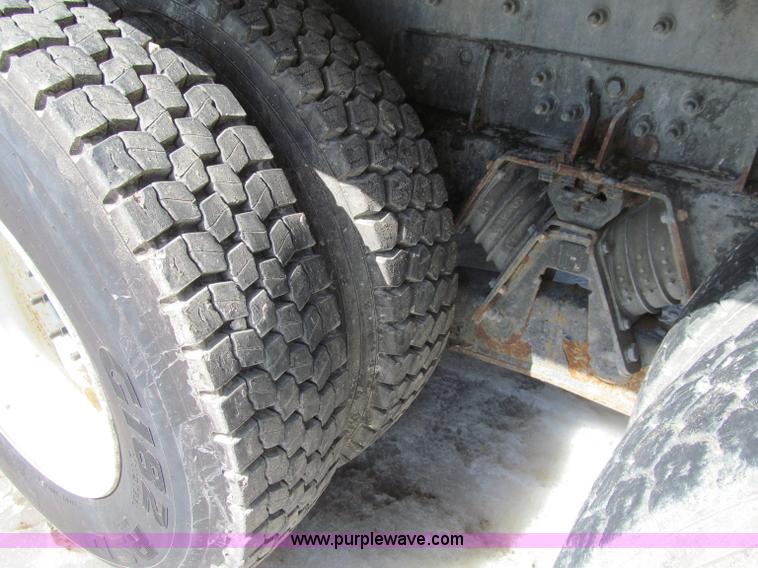 image for item D7250 2003 Freightliner FL80 Crew Cab tandem axle boom truck