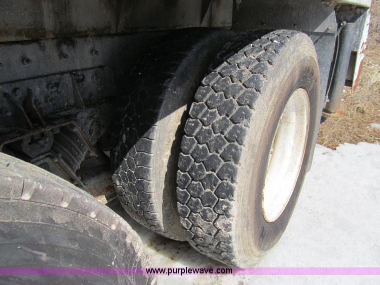 image for item D7250 2003 Freightliner FL80 Crew Cab tandem axle boom truck