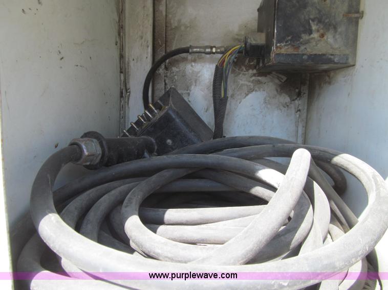 image for item D7250 2003 Freightliner FL80 Crew Cab tandem axle boom truck