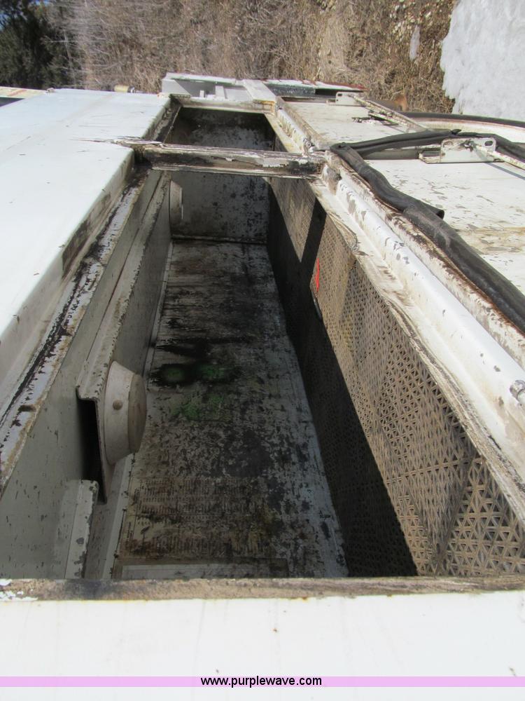 image for item D7250 2003 Freightliner FL80 Crew Cab tandem axle boom truck