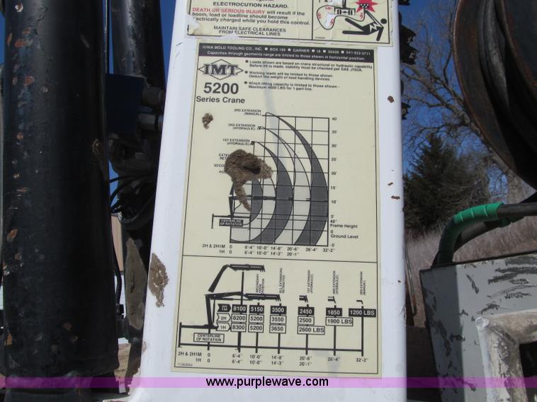 image for item D7250 2003 Freightliner FL80 Crew Cab tandem axle boom truck