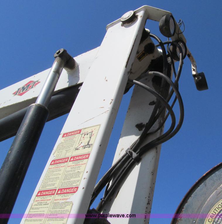 image for item D7250 2003 Freightliner FL80 Crew Cab tandem axle boom truck