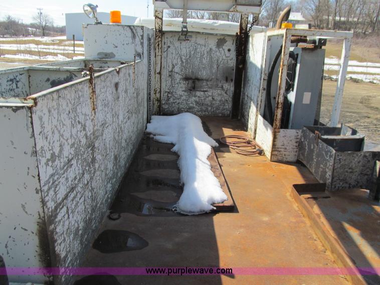 image for item D7250 2003 Freightliner FL80 Crew Cab tandem axle boom truck