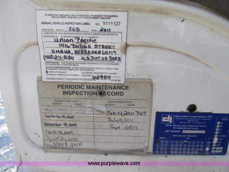 image for item D7250 2003 Freightliner FL80 Crew Cab tandem axle boom truck