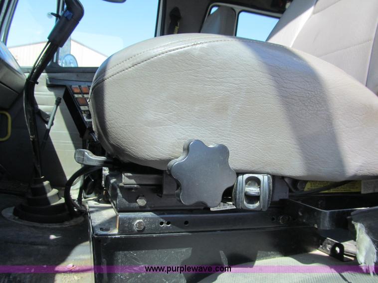 image for item D7250 2003 Freightliner FL80 Crew Cab tandem axle boom truck