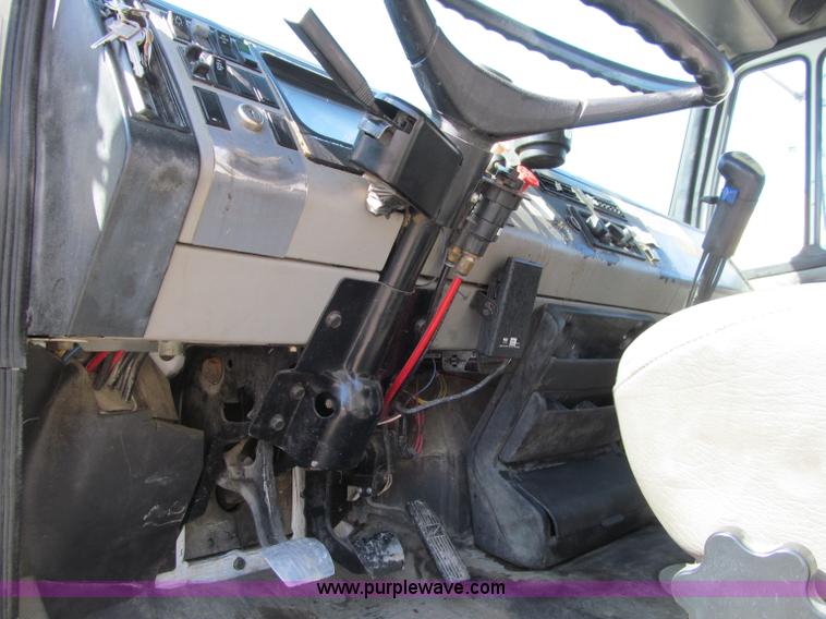 image for item D7250 2003 Freightliner FL80 Crew Cab tandem axle boom truck