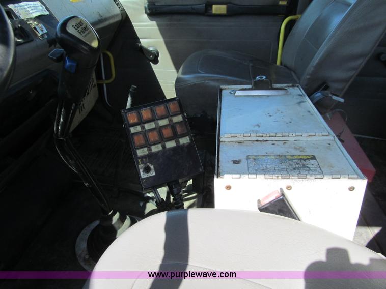 image for item D7250 2003 Freightliner FL80 Crew Cab tandem axle boom truck