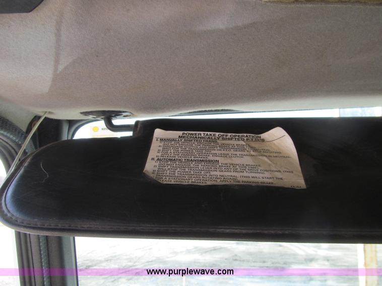 image for item D7250 2003 Freightliner FL80 Crew Cab tandem axle boom truck