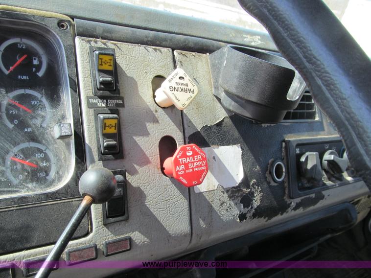 image for item D7250 2003 Freightliner FL80 Crew Cab tandem axle boom truck