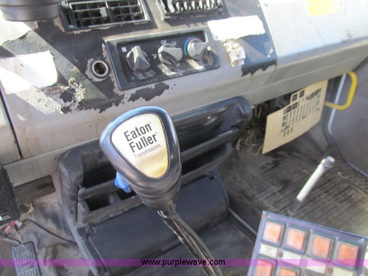 image for item D7250 2003 Freightliner FL80 Crew Cab tandem axle boom truck