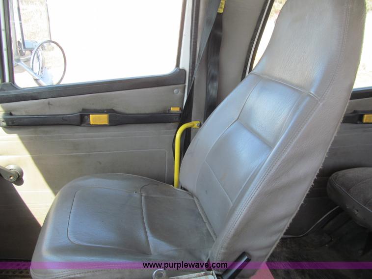 image for item D7250 2003 Freightliner FL80 Crew Cab tandem axle boom truck