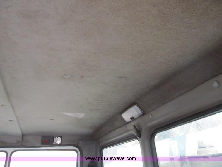 image for item D7250 2003 Freightliner FL80 Crew Cab tandem axle boom truck